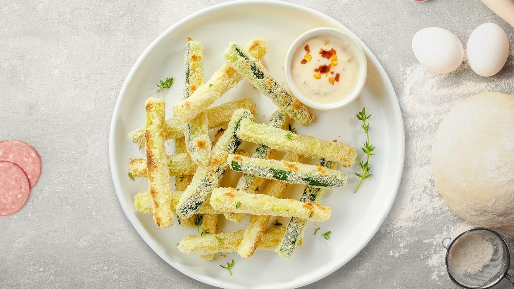 Super Zucchini Fries · (Vegetarian) Sliced zucchini breaded and fried until golden brown. Served with your choice of sauce.