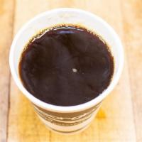 Americano · A double shot of our house espresso, topped with hot water! Similar to a brewed coffee, but ...