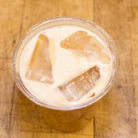 Iced Maple Latté · A double shot of espresso, warm spices, dark maple syrup, and cold milk of your choice!
