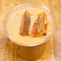 Iced Latté · A double shot of espresso over ice, topped with cold milk of your choice! Creamy and smooth!