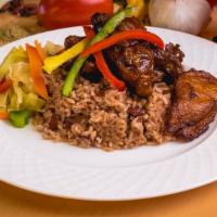 Stew Chicken · Meals are served with a side of steamed vegetables, fried plantains, a choice of plain rice ...