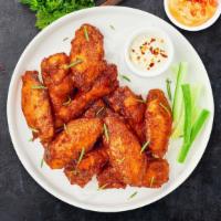 Clucking Wings Dings  · Fresh chicken wings breaded and fried until golden brown. Served with a side of ranch or ble...