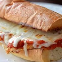 Chicken Parmesan · Chicken cutlet, Parmesan cheese, mozzarella cheese. Marinara sauce.