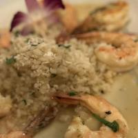 Shrimp Scampi · Shrimp sautéed in garlic, white wine & lemon served with risotto.
