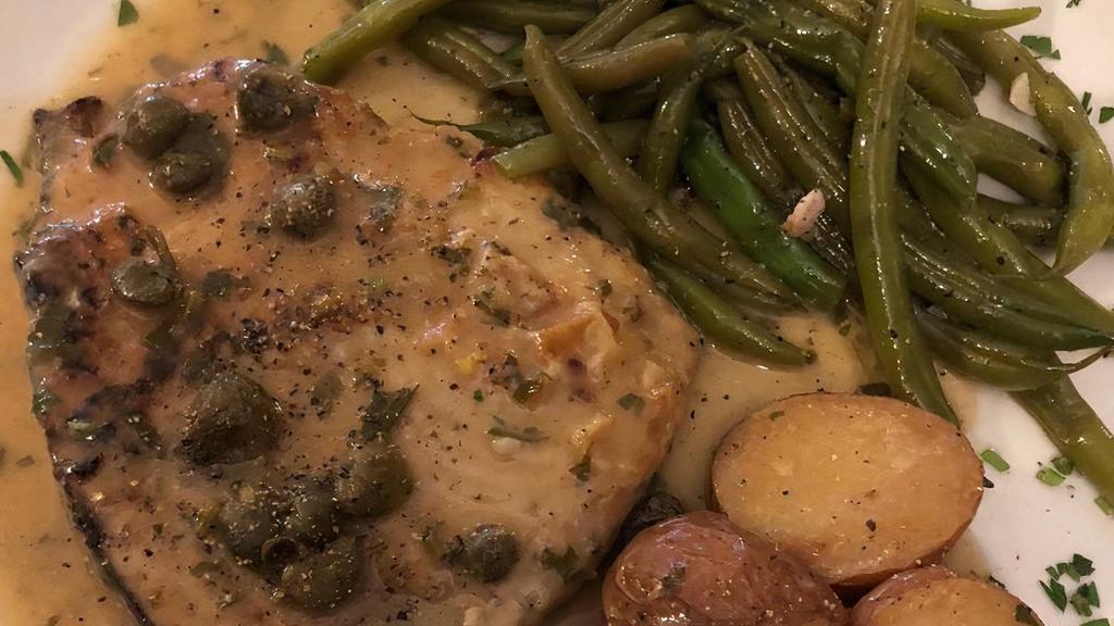 Pesce Spada · Favorite. Center cut swordfish grilled or pan seared served with marinated garlic, roasted potatoes and string beans.