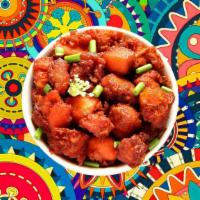 Andhra Chicken 65 · Succulent bits of house spiced chicken sautÃ©ed with chilies, coriander, mustard seed and cu...