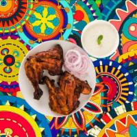 Char Grilled Tandoori Chicken · Succulent bits of house spiced chicken sautÃ©ed with chilies, coriander, mustard seed and cu...