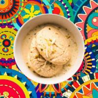 Rasmalai · Cottage cheese patties steeped in rich  in infused milk