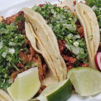 Pollo Taco · Chicken. Made on double corn tortilla with cilantro, onions, radishes, and lime.
