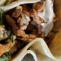 Al Pastor Taco · Spicy pork with pineapple. Made on double corn tortilla with cilantro, onions, radishes, and...