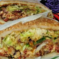 Carne Asada Cemita · Steak. Puebla style sandwich. Sesame roll, beans, lettuce, tomatoes, onions, cheese, avocado...