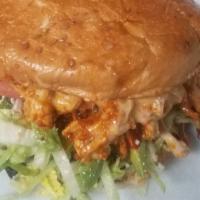 Al Pastor Cemita · Puebla style sandwich. Sesame roll, beans, lettuce, tomatoes, onions, cheese, avocado, papal...