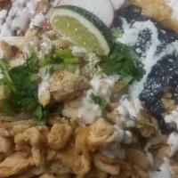 Pollo Platter · Chicken breast with grilled onion. Served with three corn tortillas, rice, beans, lettuce, s...