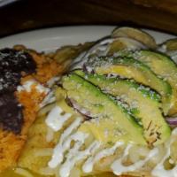 Enchiladas Platter · Three corn tortillas rolled with chicken or steak covered with green tomatillo sauce, melted...