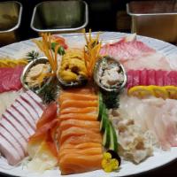 Sashimi Lunch · 12 pieces assorted sashimi/served with soup and salad. * if you want pickup price is differe...