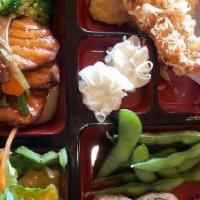 Salmon Teriyaki Box (Lunch) · Salmon grilled with a glaze of soy sauce served with rice, soup, salad, edamame, shumai, chi...