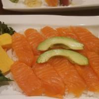 Sake Don (Lunch) · Fresh salmon over rice served with soup and salad.