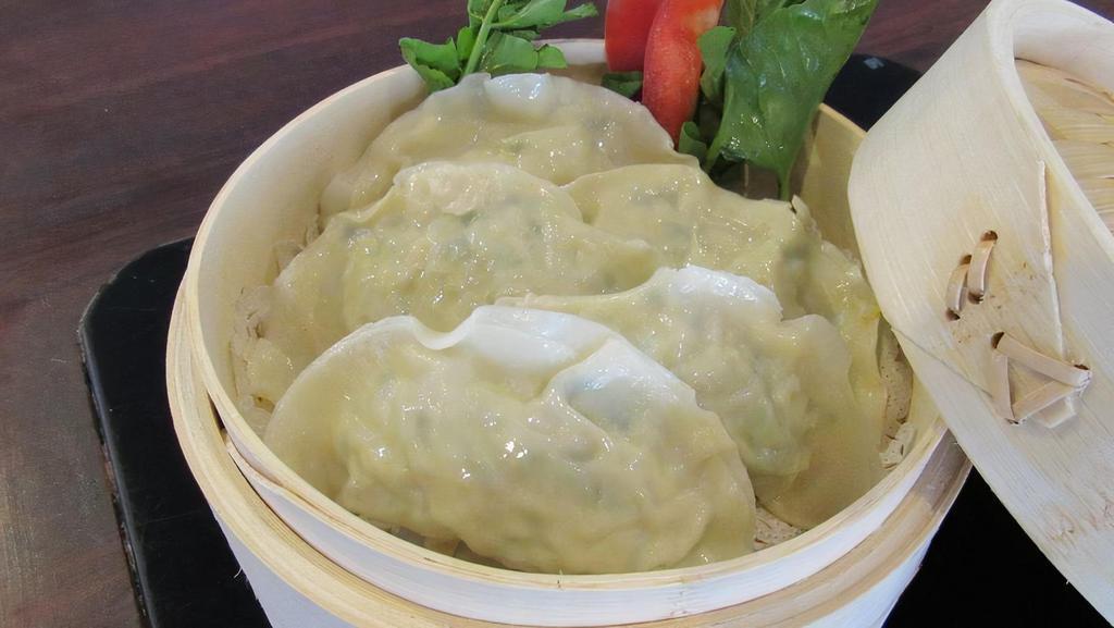 Steamed Dumpling (5 Pieces) · Steamed vegetable dumpling.