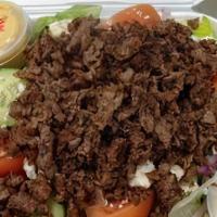 Steak House · Mixed greens topped with vine-ripened tomatoes, sweet red onions, cucumbers, grilled sirloin...