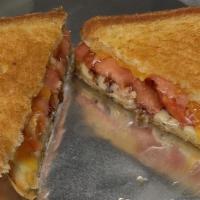 Classic Grilled Cheese · American, Cheddar, tomato, and bacon.