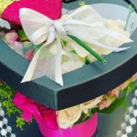 The Key To My Heart · Fresh Mini Flowers Perfect for any occasion.

Wrap in our luxury Heart shape box.
