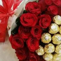 Red Passion 24 Red Roses  · 24 Premium red roses together with 2 Ferrero Rochelle Chocolates Ready to wow your loved one