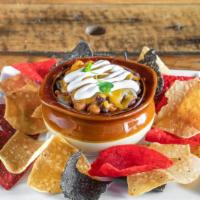 Southwestern  Style Chili · Ground beef chilli with kidney beans, jalepenos topped with shredded cheese, sour cream , to...