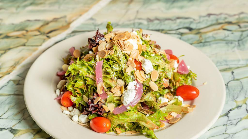 Proper Salad · Baby Mixed Greens, Goat Cheese, Almonds, 
Pickled Red Onion, & Grape Tomatoes, with a balsamic dressing.