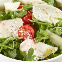 Italiana Salad · Arugula, Cherry Tomatoes, Shaved Parmigiano Reggiano