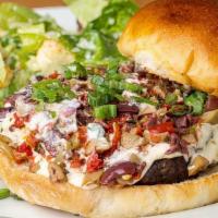 Southwest Burger · angus beef, smoked gouda cheese sauce, roasted pepper relish, red & green onions