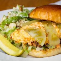 Fried Chicken Sandwich · southern pimento cheese spread, pickled green tomatoes, shredded lettuce