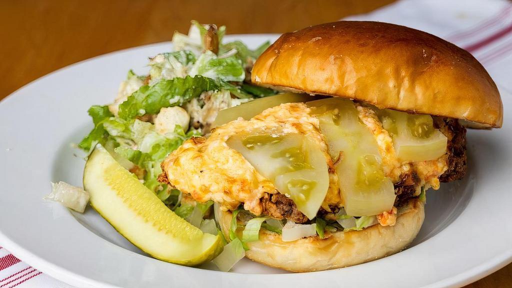 Fried Chicken Sandwich · southern pimento cheese spread, pickled green tomatoes, shredded lettuce