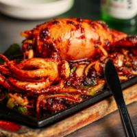 Bbq Squid Soondae · Grilled Whole squid with stuffed pork belly.
