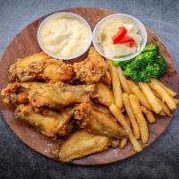 Fried Chicken (10Pcs) · Fried chicken wings with french fries.