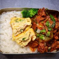 Spicy Pork Rice · Stir-fried pork belly with red pepper paste, minced garlic, and vegetables with white rice.