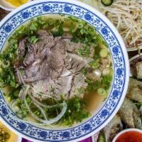 Pho 5 · Well-done brisket and beef short plate in our pho broth