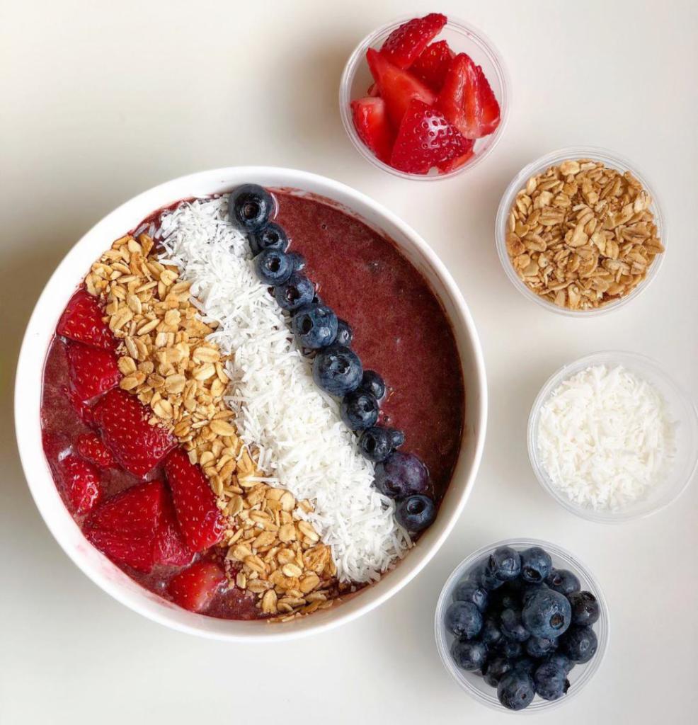 The Og Acai Bowl · Organic Brazilian Acai with coconut flakes, granola, fresh blueberries and strawberries and honey.
Toppings included on the side.