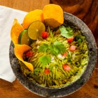 Fresh Table Side Guacamole · Recommended. Vegetarian. Freshly made table side guacamole with avocados, jalapeño, tomato, ...