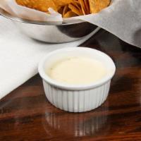 Cheese Dip · Melted American cheese with a touch of mexican.