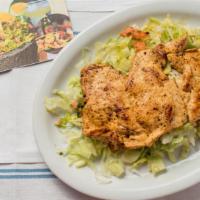 Chicken Fajita Salad · Grilled chicken over a bed of shredded lettuce, pico de gallo. Cucumbers, avocado slices, an...