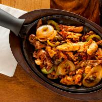 Fajita For Two · The perfect mix of beef  chicken , shrimp , and pork , comes with 2 side plates of rice and ...