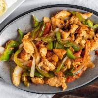 Chicken · Sliced grilled chicken with bell peppers and onions.