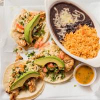 Tacos De Pollo · Corn tortillas with grilled chicken with  cilantro, shredded cheese, avocado, and tomatillo ...