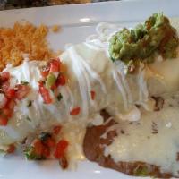 Burrito Mex · 660 cal.  One flour tortilla filled with your choice of grilled steak or chicken,  onions an...