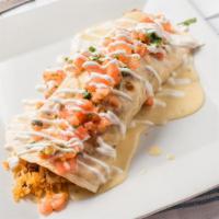 Lunch Burrito San Jose · Lunch sized burrito filled with grilled chicken, chorizo, rice, and beans. Drizzled with che...