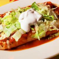 Burrito Deluxe · One beef or chicken burrito with beans topped with lettuce, sour cream cheese and pico de ga...