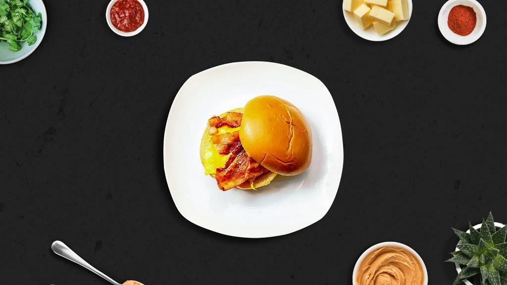 Be The Bacon & Egg Sandwich · Crispy bacon and eggs served on warm bread.