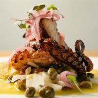 Octopus · Seafood. Elia's signature octopus that is grilled over an oak-wood fire & served with marina...