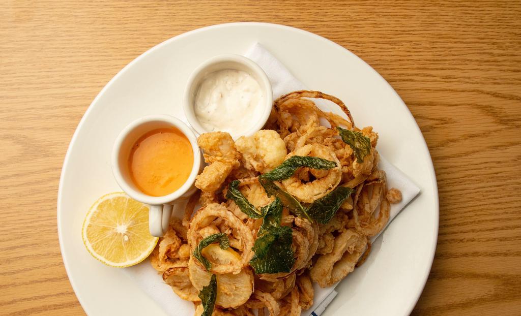 Fried Aegean Calamari · Seafood. Served with a chickpea lemon spicy tomato sauce as well as a house made tartar sauce.