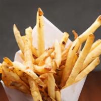 Greek Hand Cut French Fries · Freshly cut potatoes that are fried to perfection and served with crushed red pepper & kefal...